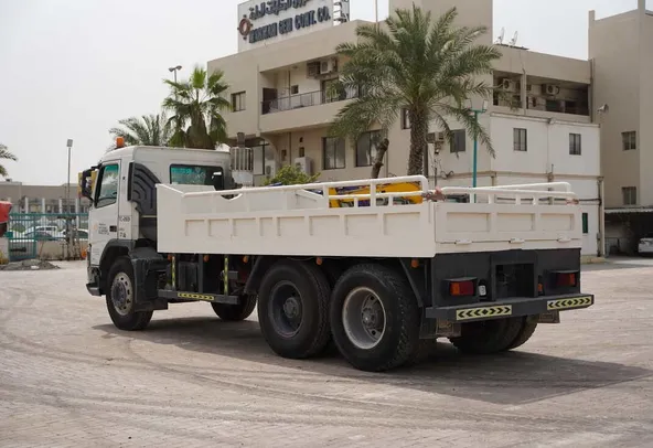 Volvo FM12 Cargo Truck 6x4 - Superior Traction-Spacious Bed-Rear-Left-Image
