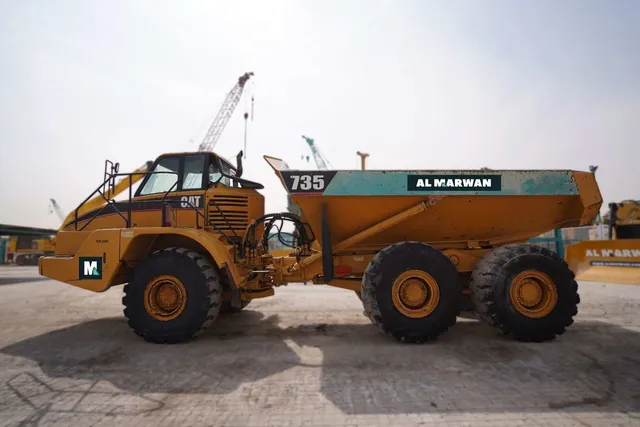2004 Caterpillar 735 Articulated Dump Truck Left View