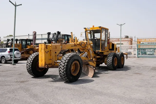 2009 Komatsu GD705A-4AE Motor Grader Front Left View