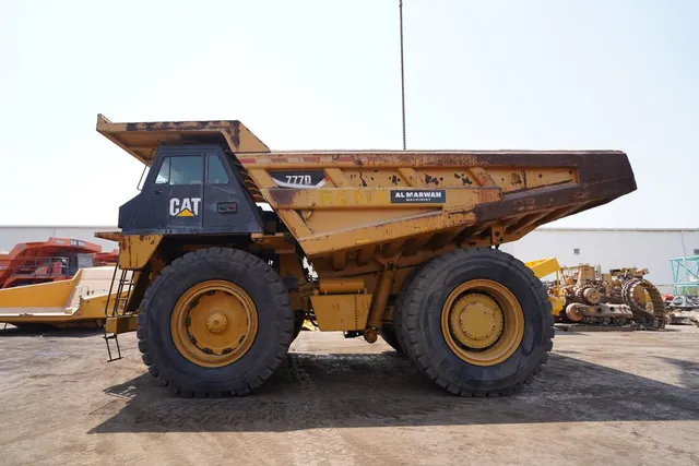 2011 cat 777D rigid dump truck left side image