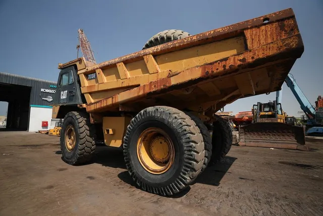 2012 cat 773E rigid dump truck rear left view