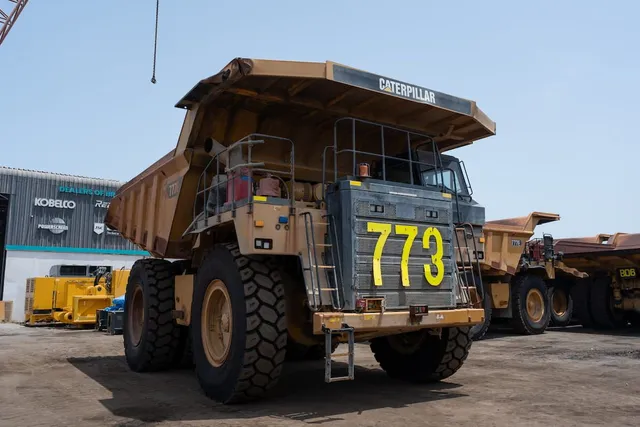 2019 Caterpillar 777E Rigid Dump Truck Front Right Side View