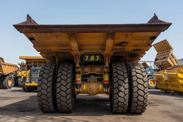 2021 Caterpillar 777E Rigid Dump Truck Rear View