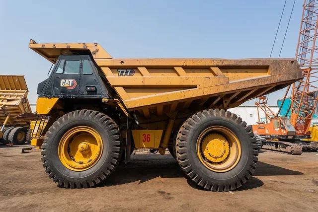 2022 Caterpillar 777E Rigid Dump Truck Left Side View