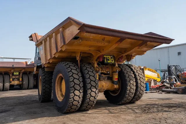 2022 Caterpillar 777E Rigid Dump Truck Rear Left View