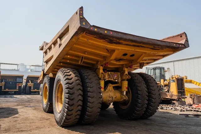 2022 Caterpillar 777E Rigid Dump Truck Rear Left View