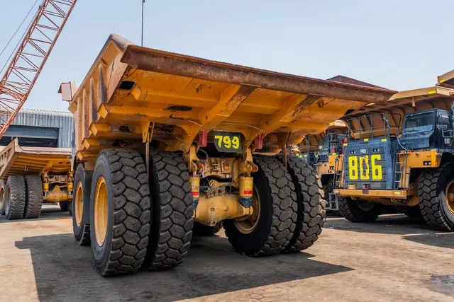 2022 Caterpillar 777E Rigid Dump Truck Rear Left VIew 