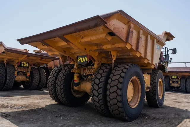 2022 Caterpillar 777E Rigid Dump Truck Rear Right View