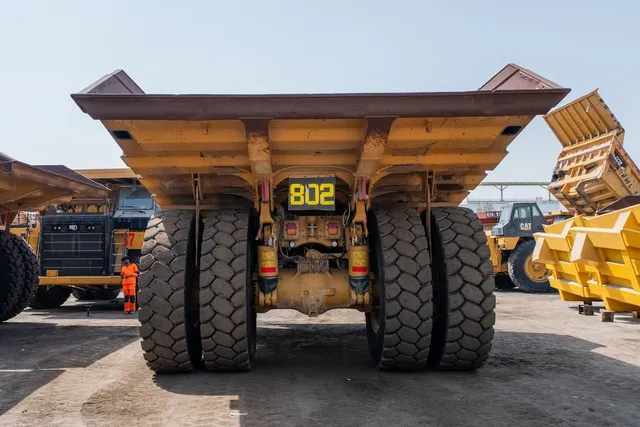 2022 Caterpillar 777E Rigid Dump Truck Rear View