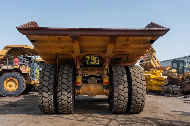 2022 Caterpillar 777E Rigid Dump Truck Rear View