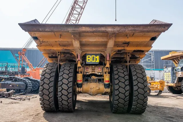 2022 Caterpillar 777E Rigid Dump Truck Rear View