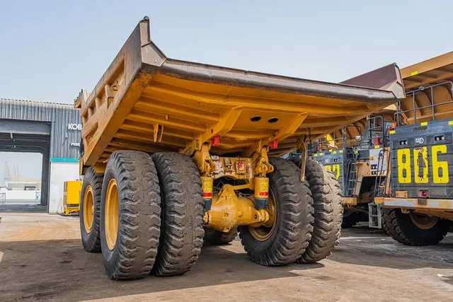 2023 Caterpillar 777 Rigid Dump Truck Rear Left View