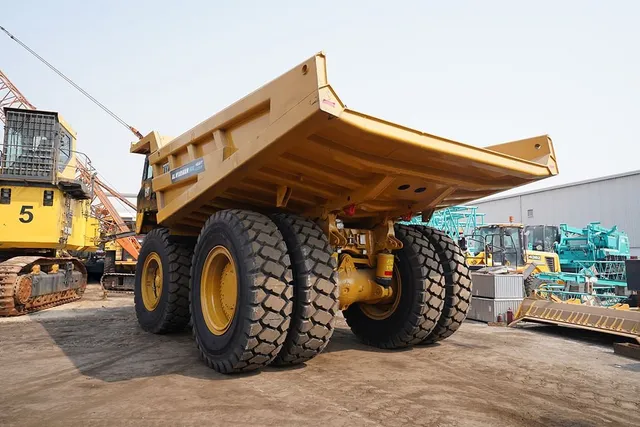 2023 Caterpillar 777 Rigid Dump Truck Rear Left View