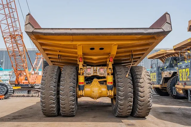 2023 Caterpillar 777 Rigid Dump Truck Rear View