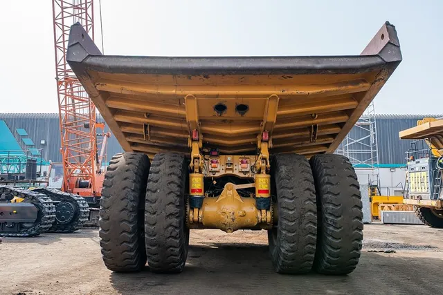 2023 Caterpillar 777 Rigid Dump Truck Rear View