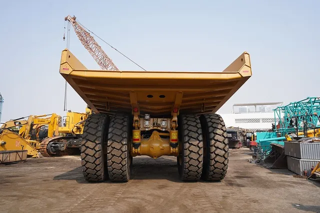 2023 Caterpillar 777 Rigid Dump Truck Rear View