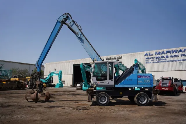 Material Handler 2013 Terex Fuchs MHL 335 left side view - Al Marwan Heavy Machinery