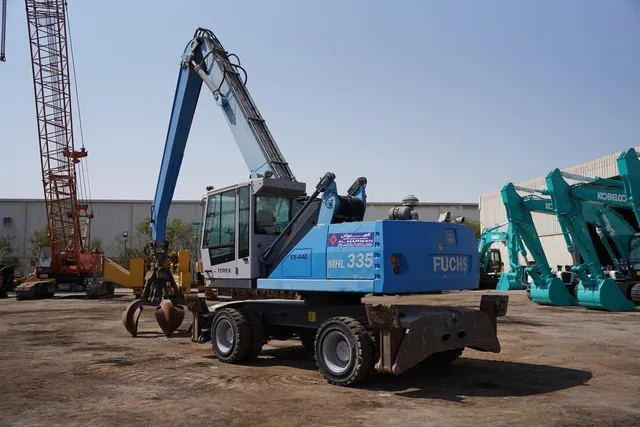 Material Handler 2013 Terex Fuchs MHL 335 rear left view - Al Marwan Heavy Machinery
