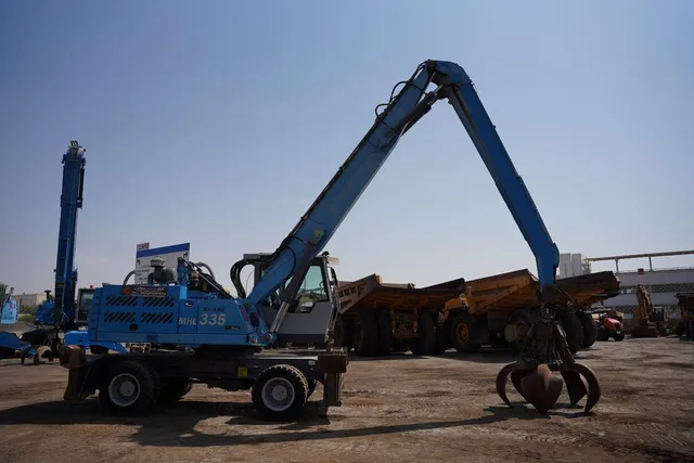 Material Handler 2013 Terex Fuchs MHL 335 right side view - Al Marwan Heavy Machinery
