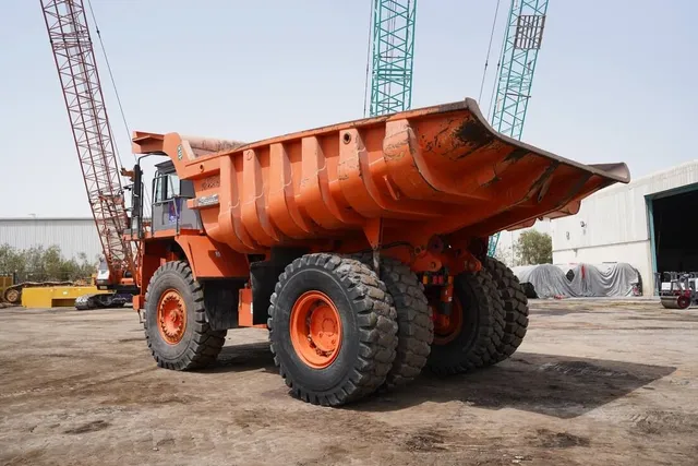 2011 Hitachi EH1100-3 Rigid Dump Truck rear left view - Al Marwan Heavy Machinery