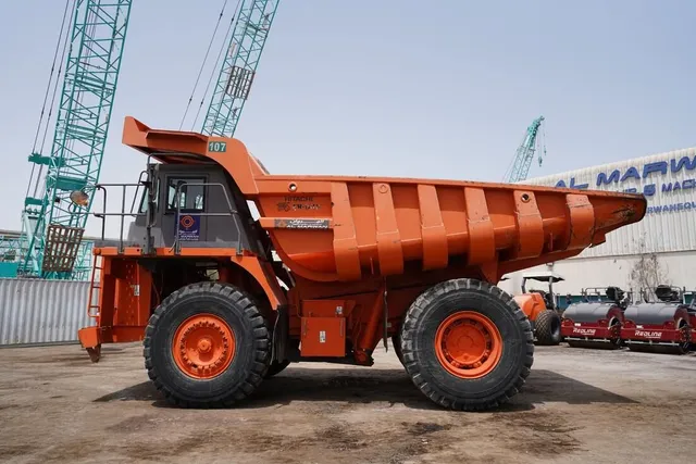 Rigid Dump Truck 2011 Hitachi EH1100-3 - left side view - Al Marwan Heavy Machinery