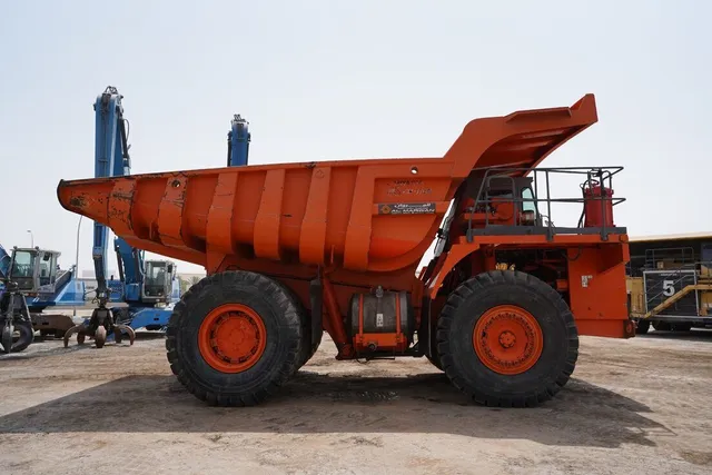 Rigid Dump Truck 2011 Hitachi EH1100-3 - right side view - Al Marwan Heavy Machinery