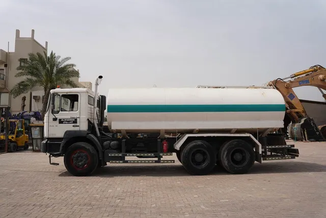 Used MAN 33.373DFC Water Truck-Efficient Water Distribution-Left-Side-View