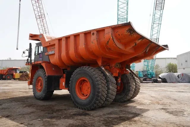 2011 Hitachi EH1100-3 Rigid Dump Truck rear left view - Al Marwan Heavy Machinery
