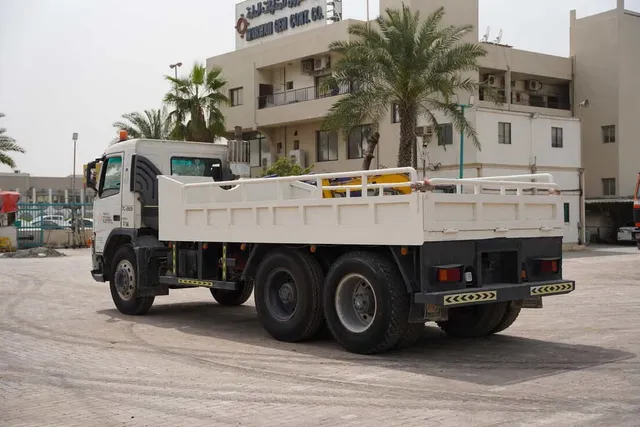 Volvo FM12 Cargo Truck 6x4 - Superior Traction-Spacious Bed-Rear-Left-Image