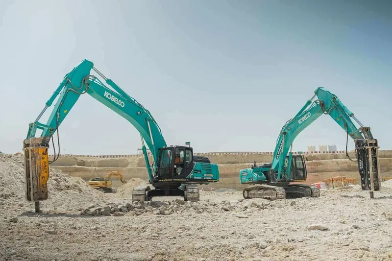 two kobelco excavators