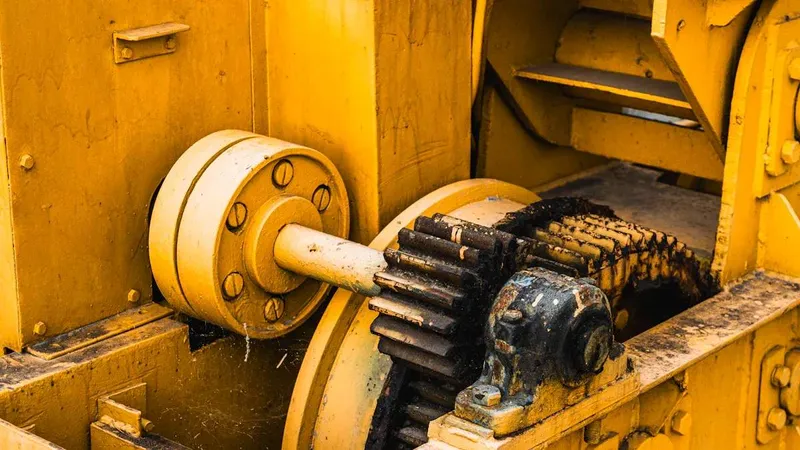 Transmission & Gear Oil (Reddish to Dark Brown): Heavy and viscous with a pungent, burnt-sulfur odor. Found around axles, final drives, and gearbox housings.