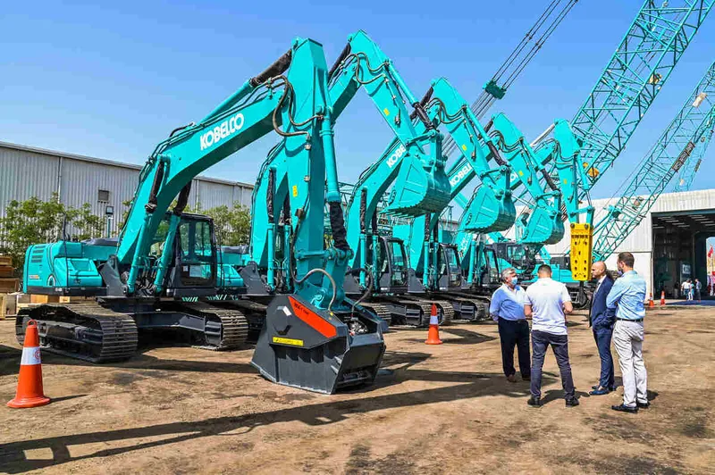 A range of brand new Kobelco excavators and cranes at one of Al Marwan’s yards