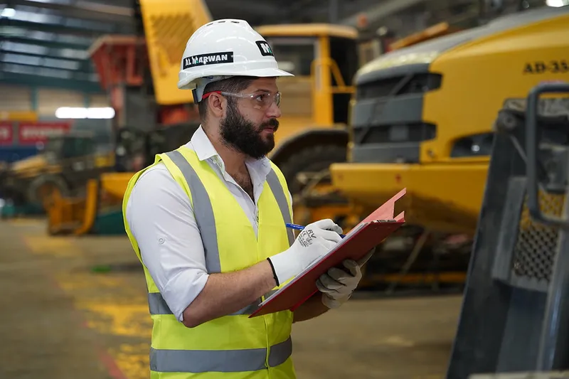 An Al Marwan worker conducts Quality Checks. 