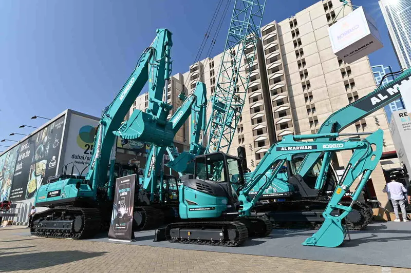 Kobelco cranes and excavators on display at Al Marwan Machinery’s booth at the BIG5 UAE 2022