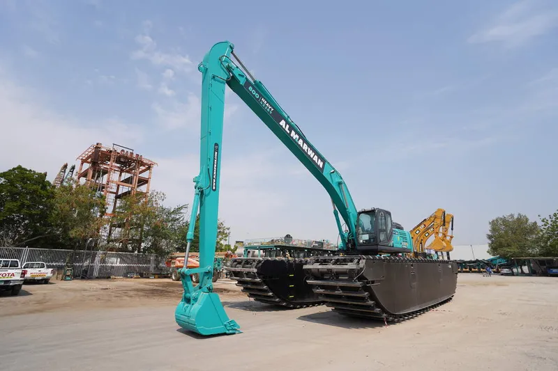 A Kobelco SK380 equipped with an amphibious undercarriage and an 18m boom