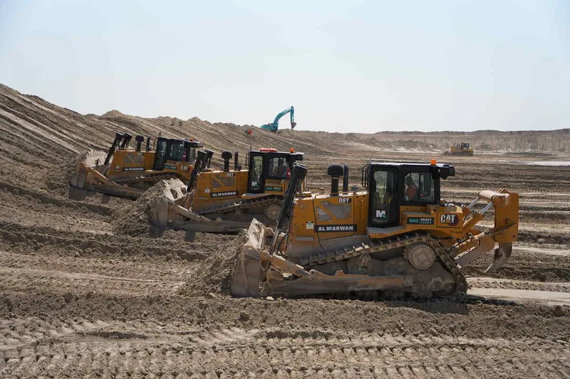 Multiple CAT D8T crawler dozers on an Al Marwan job site in Abu Dhabi, UAE