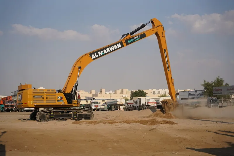 The Caterpillar 395 excavator in a long-boom configuration on Al Marwan Machinery's rental equipment fleet