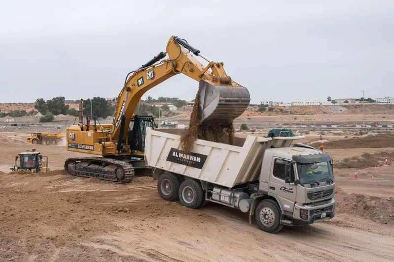 cat excavator and Al marwan dumper
