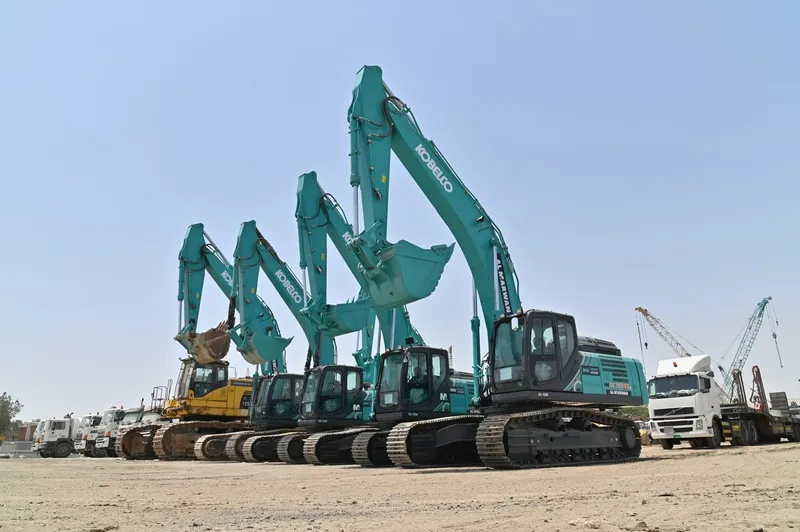 A lineup of Al Marwan Machinery's KOBELCO excavators in the medium size class on our Jebel Ali yard in Dubai, UAE