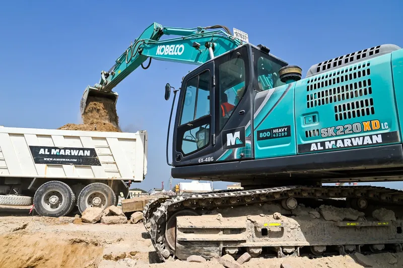 An Al Marwan Kobelco SK220 on a job site