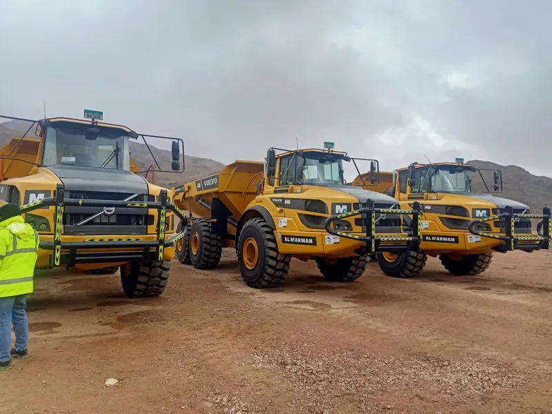 Lineup of Volvo A45G ADTs at NEOM site in Saudi Arabia