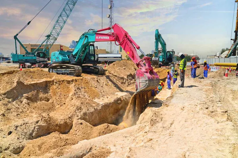 Pair of SK220 excavators with standard boom