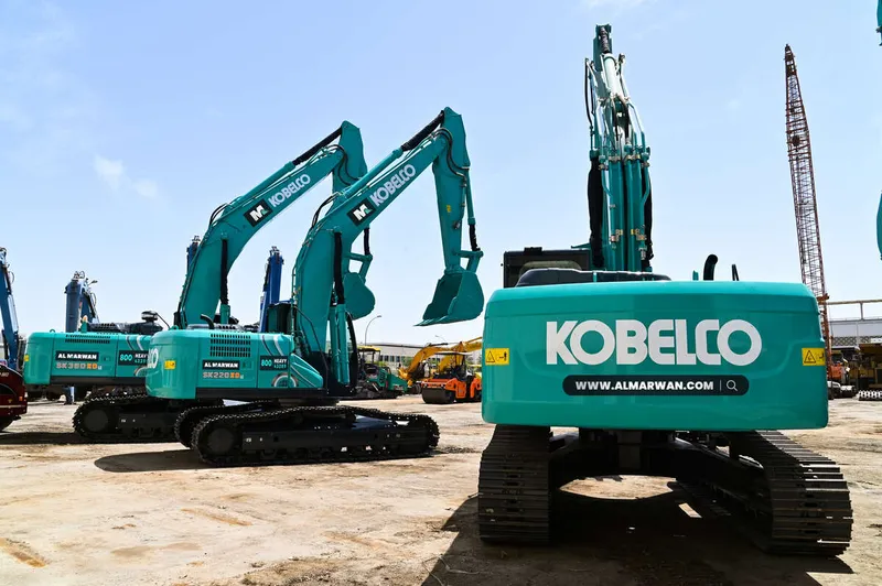 Multiple Kobelco SK220 and SK380 excavators at Al Marwan yard