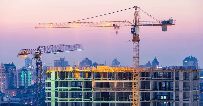 Tower cranes are fixed to the ground