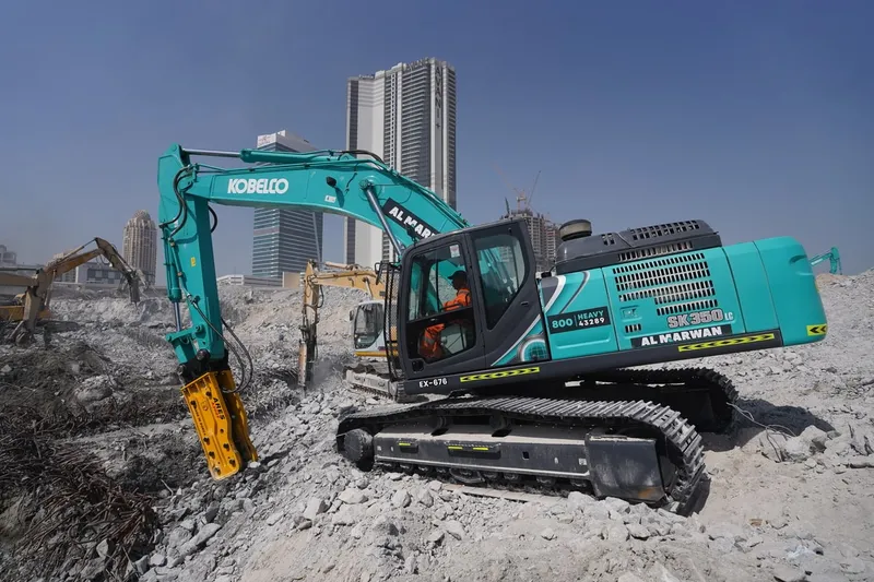 KOBELCO SK380 excavator coupled with a Jisung JSC jackhammer on a demolition job in Dubai