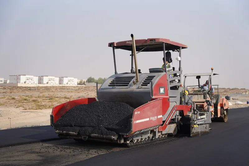 A Dynapac DRF25 track asphalt-laying paver