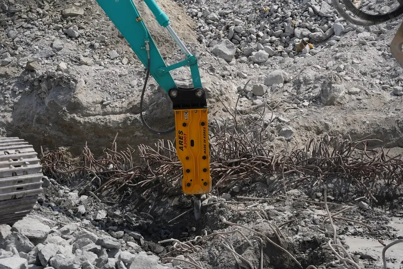 Jisung (JSC) ARES jackhammer fitted on a KOBELCO excavator as a machinery attachment for demo work