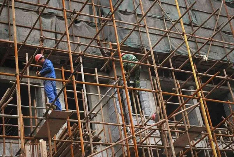 scaffolding and workers