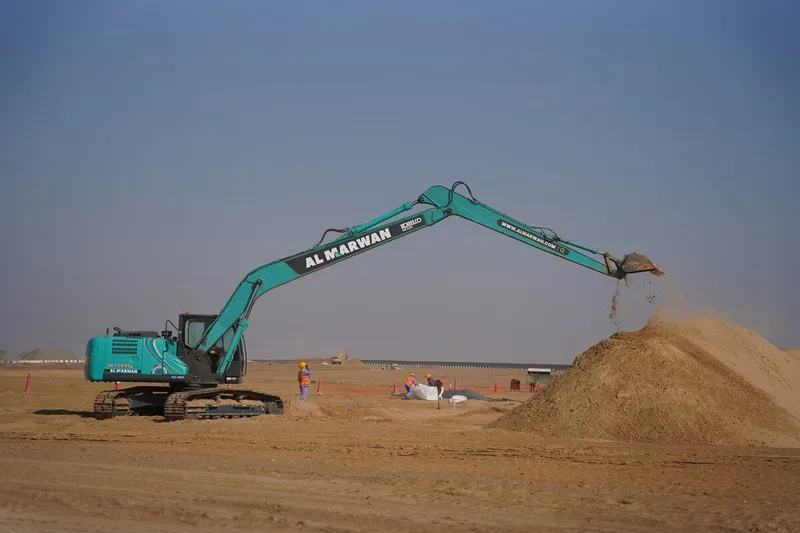 Kobelco SK220 equipped with a long reach boom