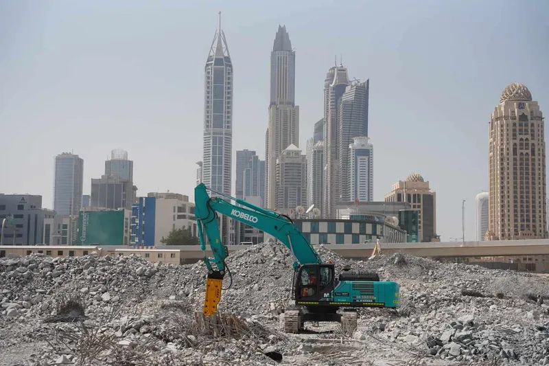 SK380 Kobelco excavator equipped with a JSC jackhammer.